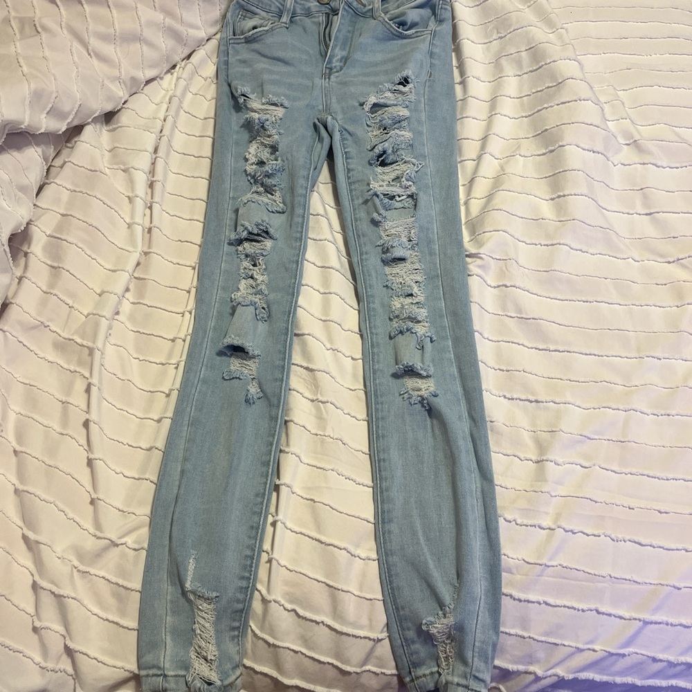 Light blue ripped high-waisted skinny jeans